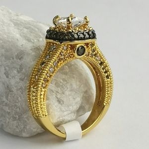 Elegant Gold-Tone Women's Ring with Black and Clear Stones